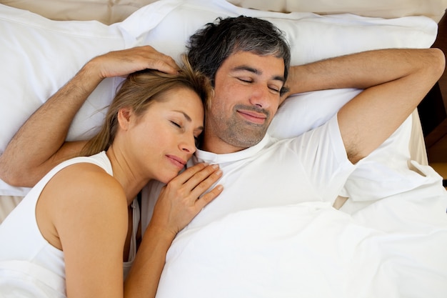 Positive couple sleeping