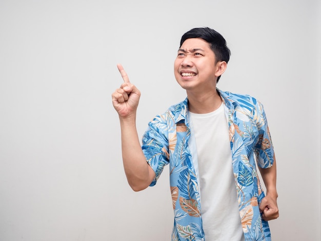 Positive man beach shirt appreciate happy about holiday gesture point finger isolated