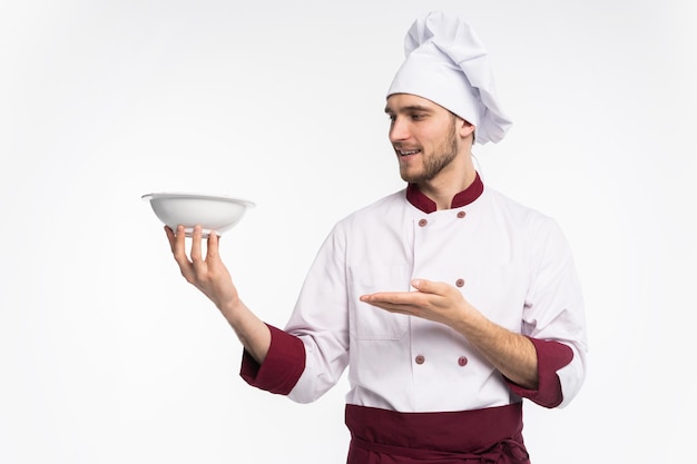 Positive professional happy man chef showing tasty ok sign isolated on white background.