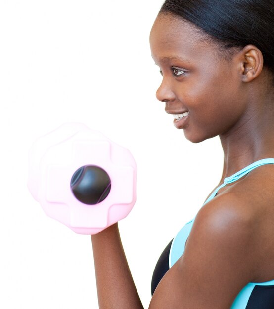 Positive woman working out with dumbbell 