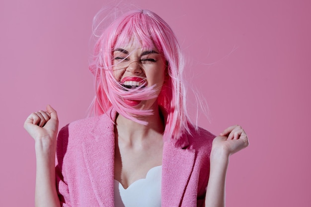 Photo positive young woman in a pink blazer pink wig cropped view pink background unaltered