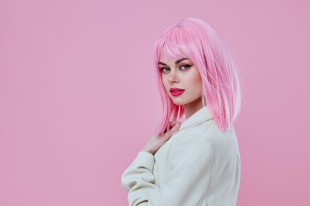 Positive young woman pink hair posing studio model unaltered