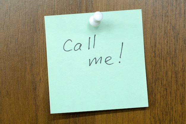 Post it note with call me!  phrase