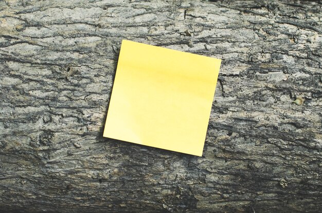 Photo post it note on an wood background