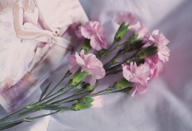 Postcard and delicate pink flowers