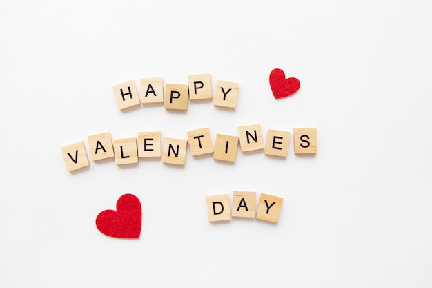 Postcard Happy Valentine's Day Wooden lettering Happy Valentine's Day Red heart on a white background