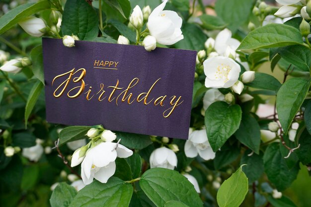 postcard Internet banner flat lay with a birthday greeting with the inscription happy birthday