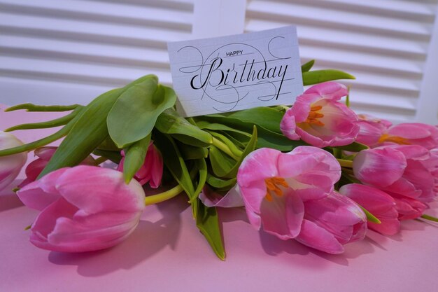 postcard Internet banner with a birthday greeting with the inscription happy birthday a bouquet