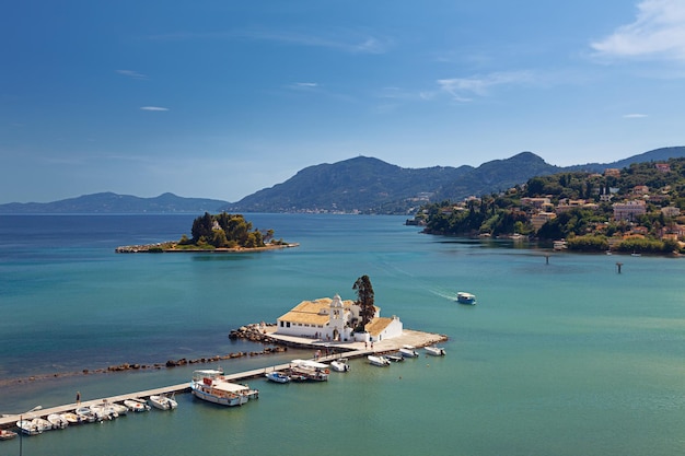 Postcard view of Vlacherna Monastery and Mouse island on Corfu Greece