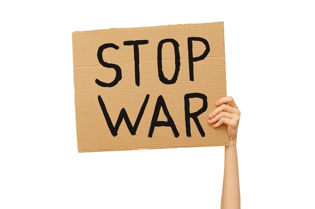 poster against the war made of cardboard in hand international day of peace isolated on a white background