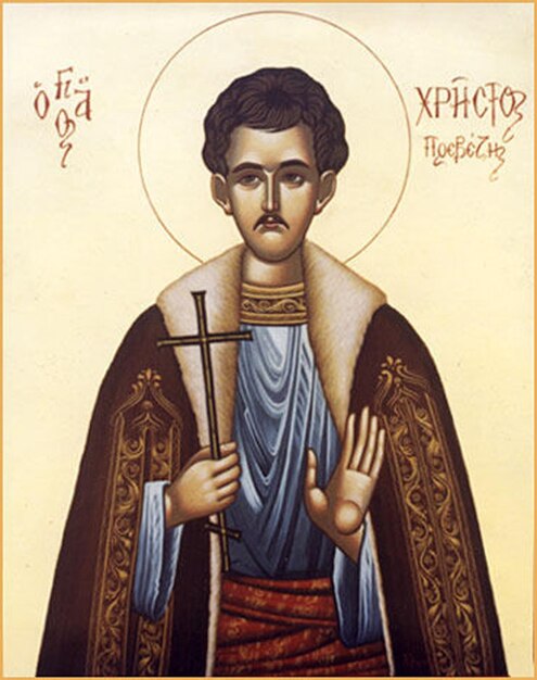 a poster of a man with a cross on his chest