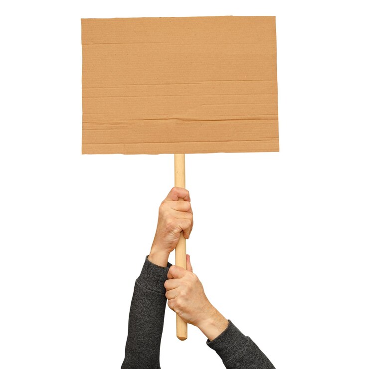Posters of cardboard in his hands Isolated on white Copy space