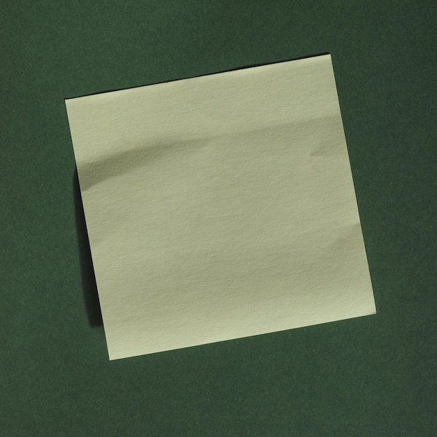 Photo postit over green with copy space