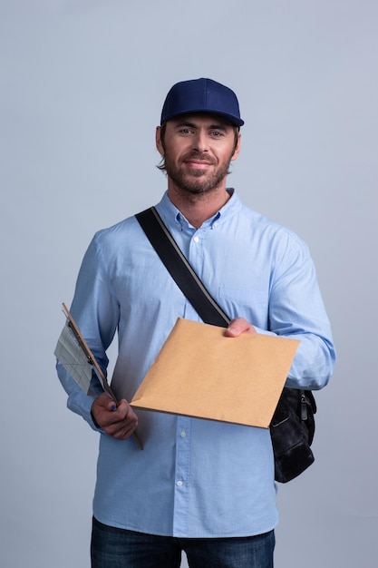 Photo postman delivering mail