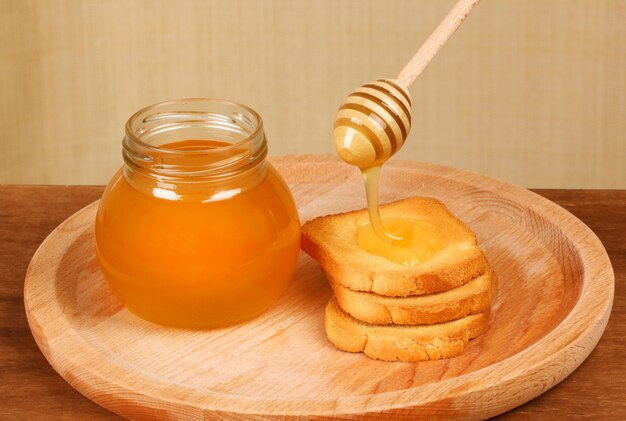 Pot of honey and rusks