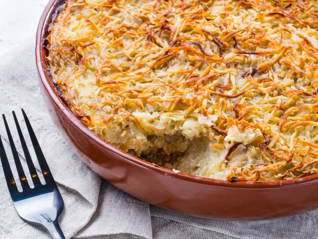 Potato casserole on table