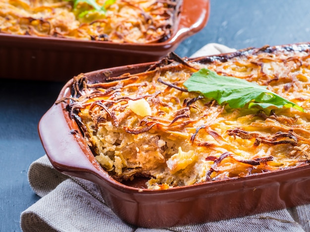 Potato casserole on table