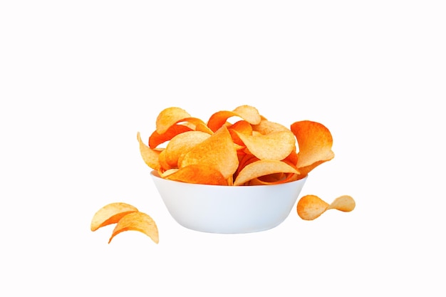 Potato chips crisps in the bowl in the white background isolated