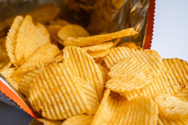 Potato chips delicious BBQ seasoning spicy for crips thin slice deep fried snack fast food in open bag