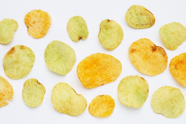 Potato chips on white background