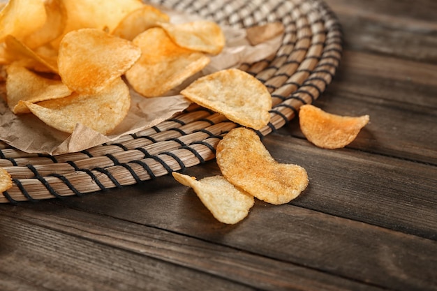 Potato chips on wicker mat