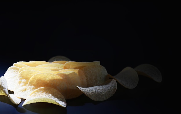 Potato and corn chips. Snacks and salty appetizer. Harmful products. Flavored Chips.