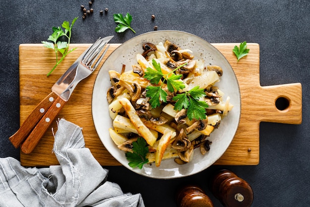 Potato fried with champignon mushrooms