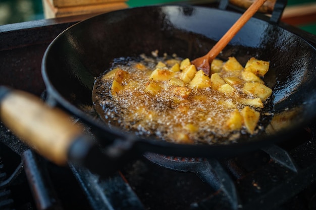 Potato frying preparing food