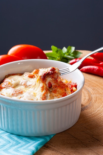 Potato gnocchi with tomato and cheese sauce.
