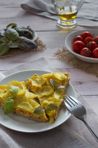 Gratin di patate con basilico