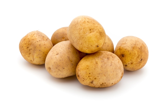 Potato isolated on white surface close up.