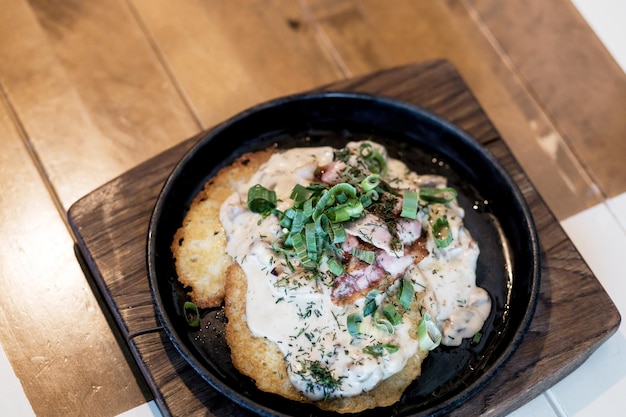 Potato pancakes with sour cream