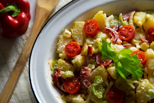 Potato salad celery cherry tomatoes and mayonnaise