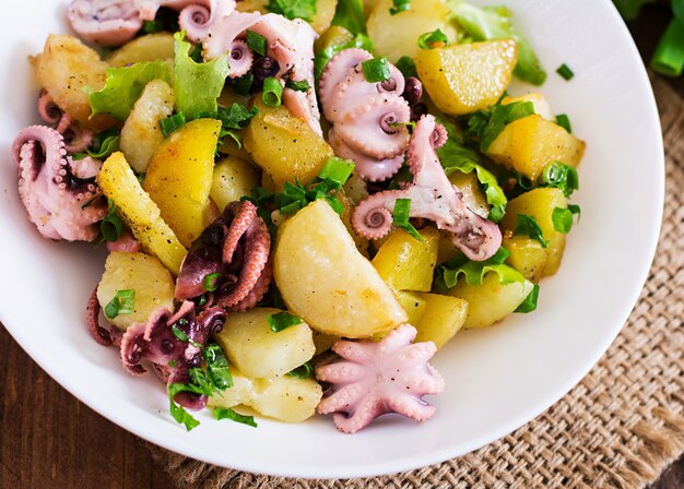 Potato salad with pickled octopus and green onions