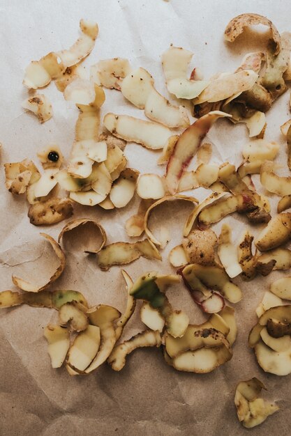 Potato skins on craft paper, abstract