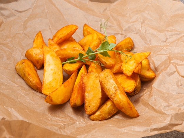 Potato slices in rustic style on craft paper