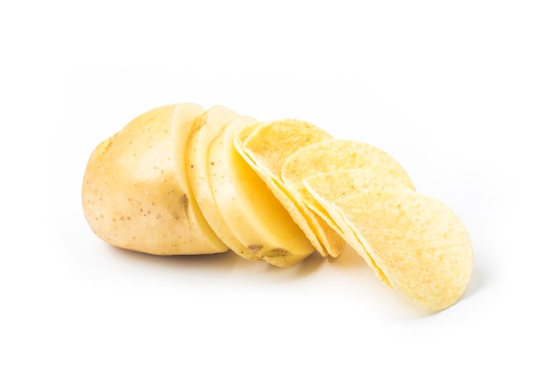 Potato slices turning into chips isolated on white background