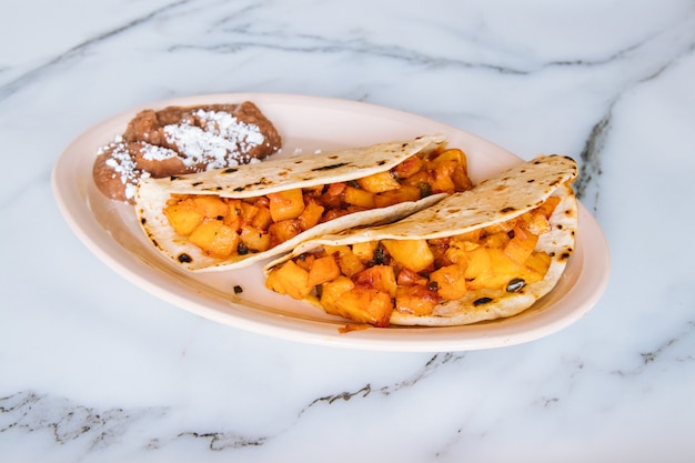 Potato tacos with beans