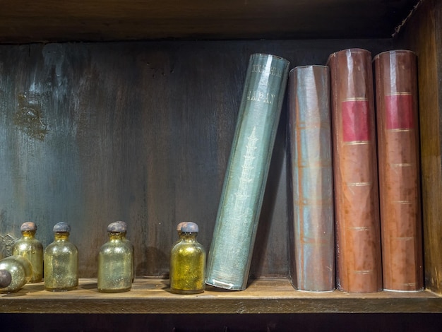 Photo potions and books on shelf