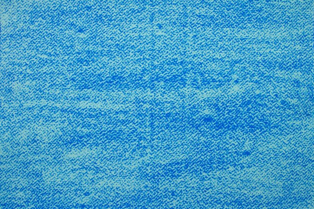 Potloodkrabbels tekenen een blauwe textuur Blauwe achtergrond van abstract denim Ruwe gestippelde textuur Artistiek kaderbehang en grafische ontwerpillustraties Kopieer ruimte voor tekst