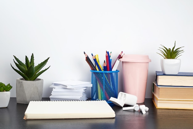 Potted plant and book on table