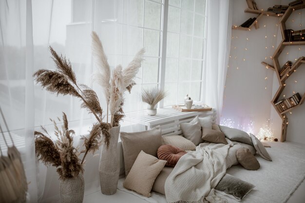 Potted plants on bed at home