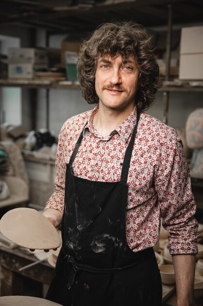 Potter master preparing the clay