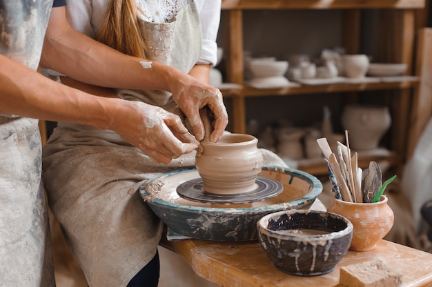 Potter teaches how make clay pot