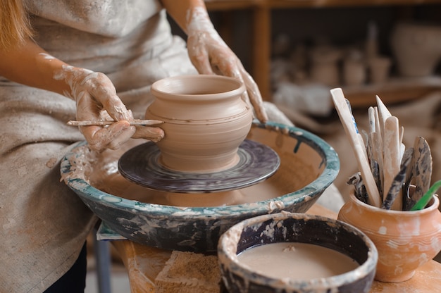 Potter teaches how make clay pot