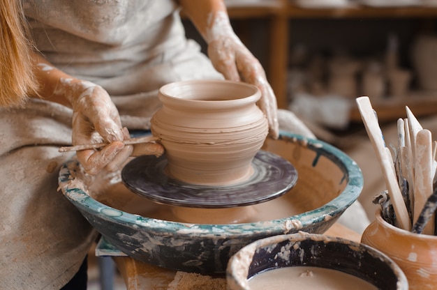 Potter teaches how make clay pot