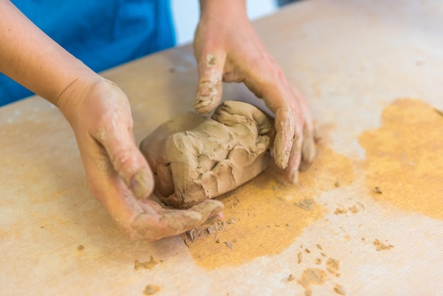 Pottering - creating a clay cup in process. Shot with a small GRIP