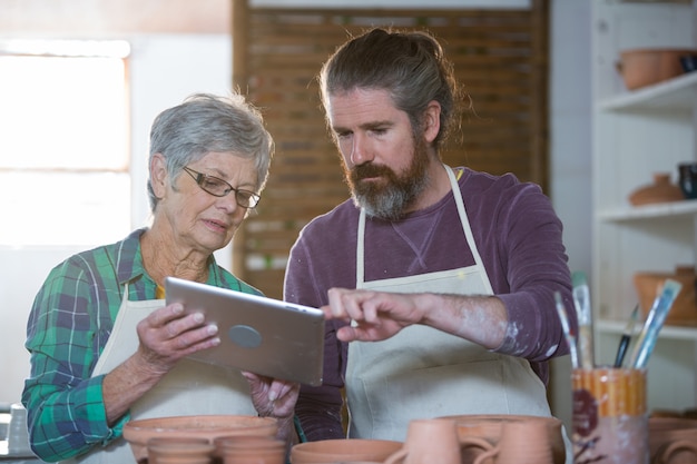 Potters using digital tablet