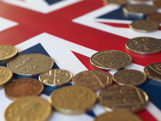 Pound coins, United Kingdom over flag