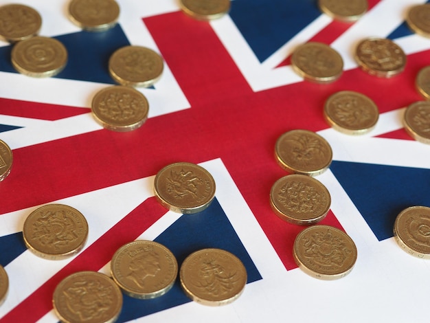 Pound coins, United Kingdom over flag